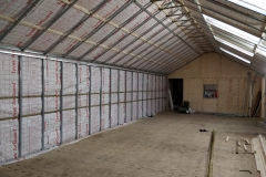 The main hall with internal studwork, ready for boarding